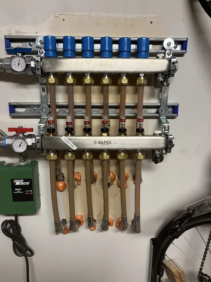 Plumber performing Water Heater Repair at a residential property in Kingston